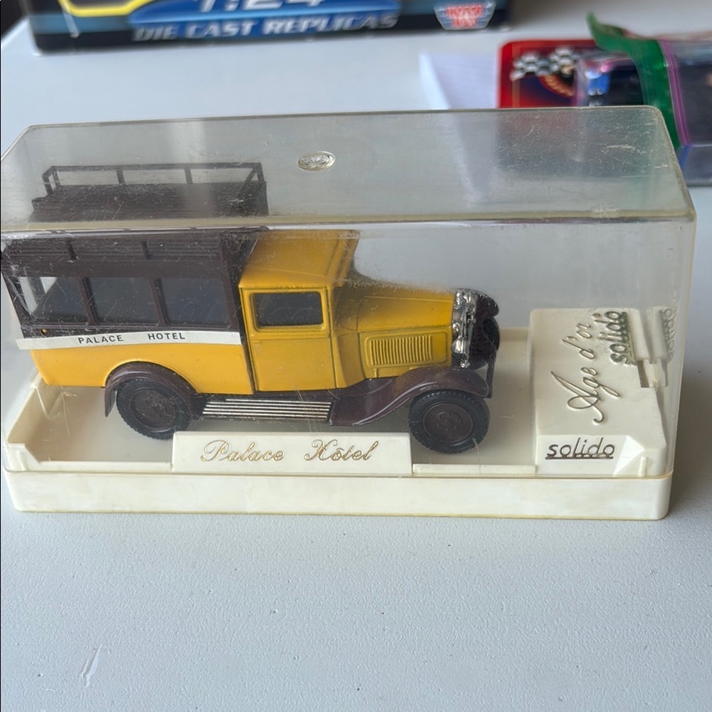 Solid Yellow and Brown Die-Cast Toy Vehicles